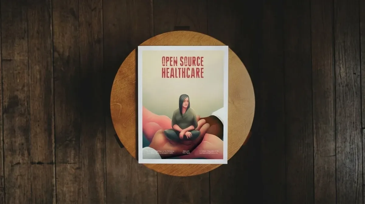 Open Source Healthcare Journal on a round wooden stool